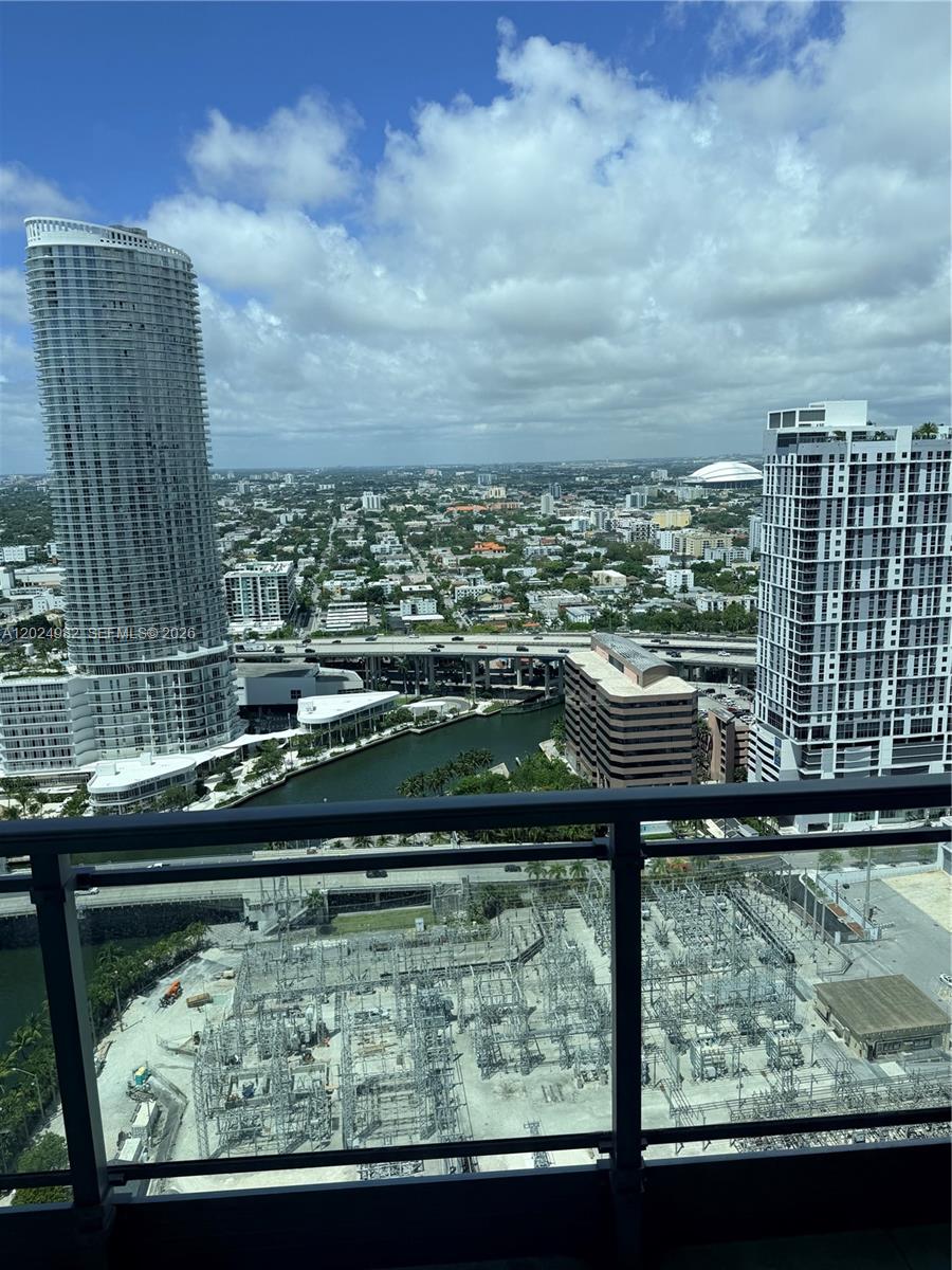 92 Southwest 3rd Street, Unit 3909 Miami, FL 33130 - Photo 12 of 13 a view of swimming pool from a balcony