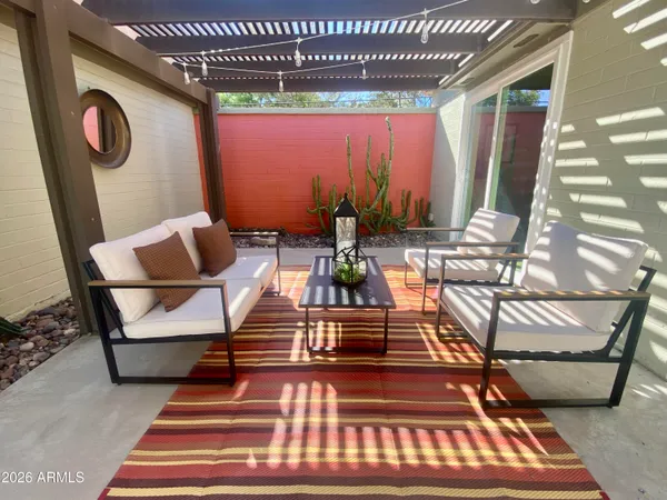 a bedroom with a bed and a mirror