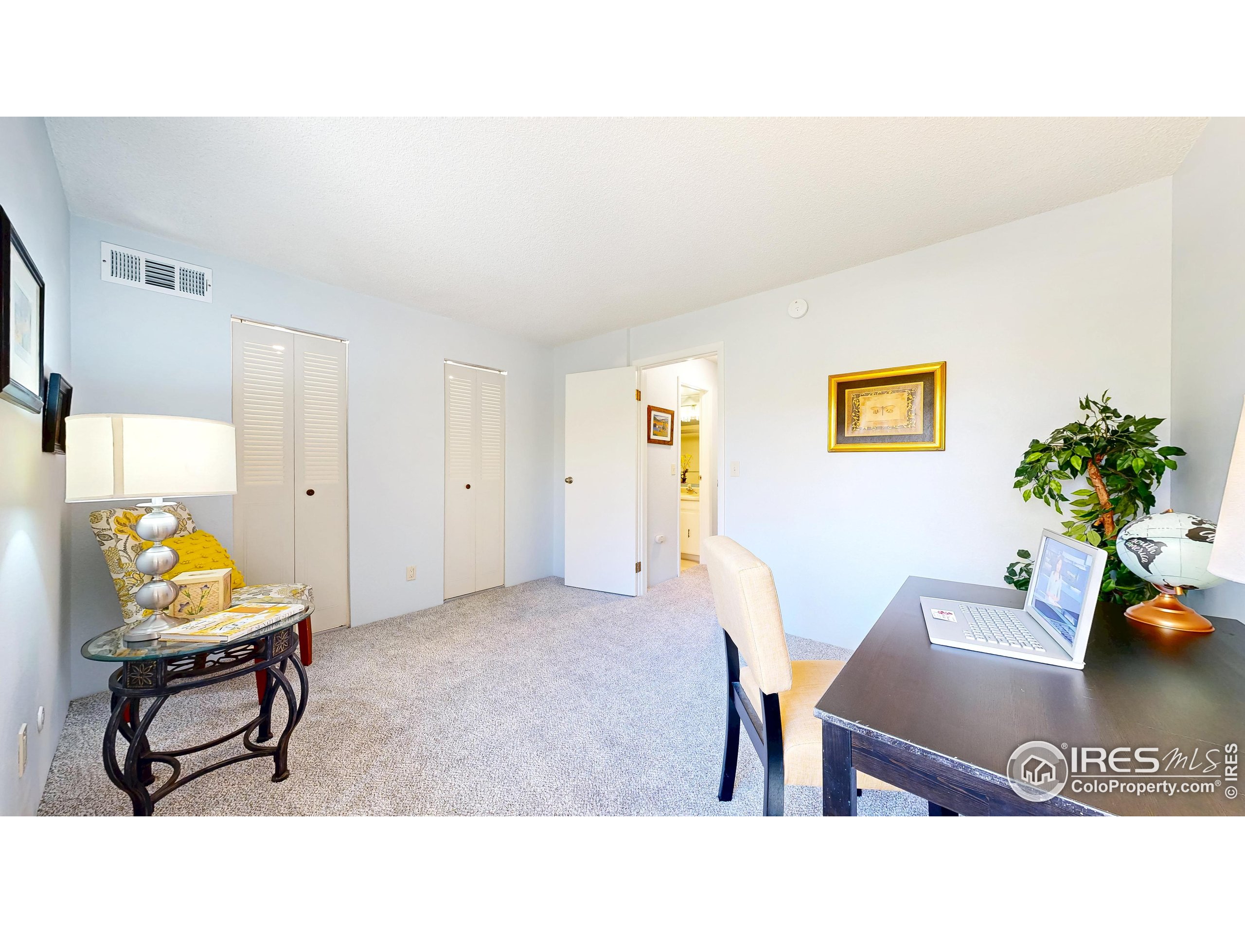 1705 Heatheridge Road, Unit K105 Fort Collins, CO 80526 - Photo 17 of 30 a living room with furniture and a window