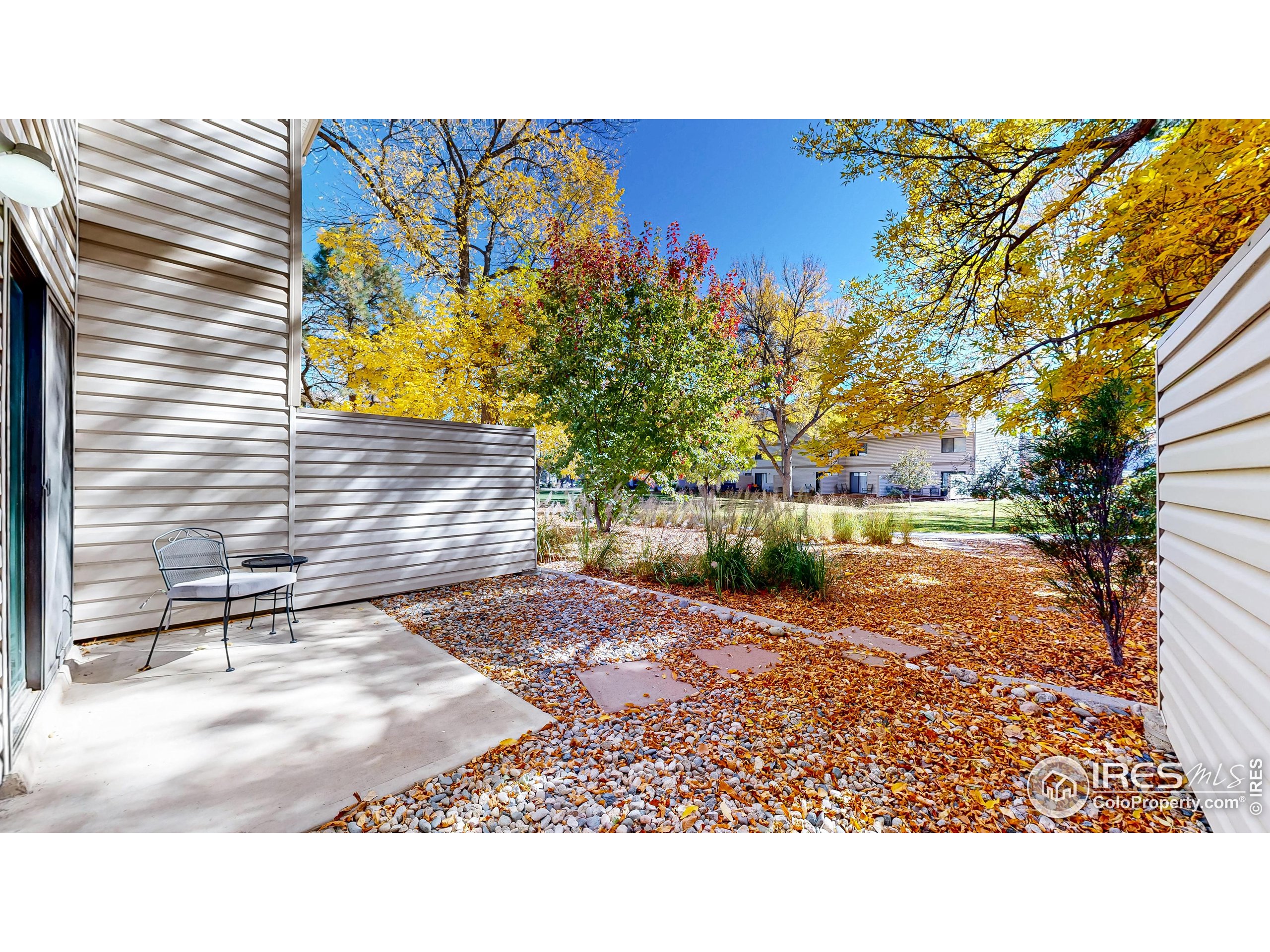 1705 Heatheridge Road, Unit K105 Fort Collins, CO 80526 - Photo 19 of 30 a view of a street with a building in the background