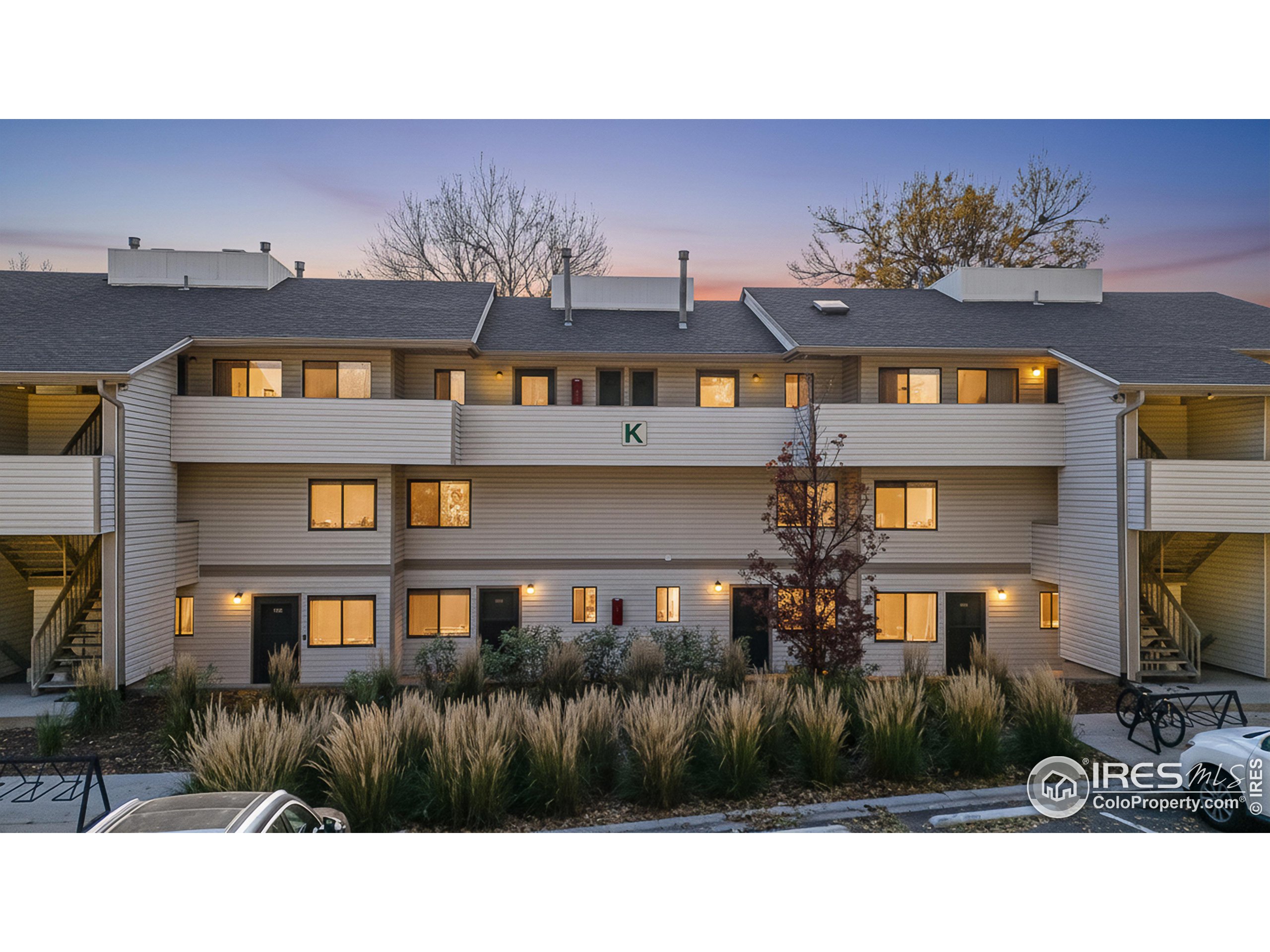 1705 Heatheridge Road, Unit K105 Fort Collins, CO 80526 - Photo 2 of 30 a view of a house with a patio