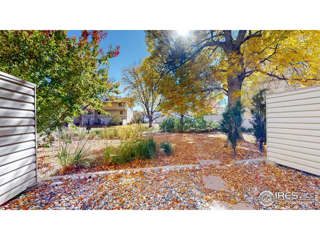 a aerial view of a house with a yard