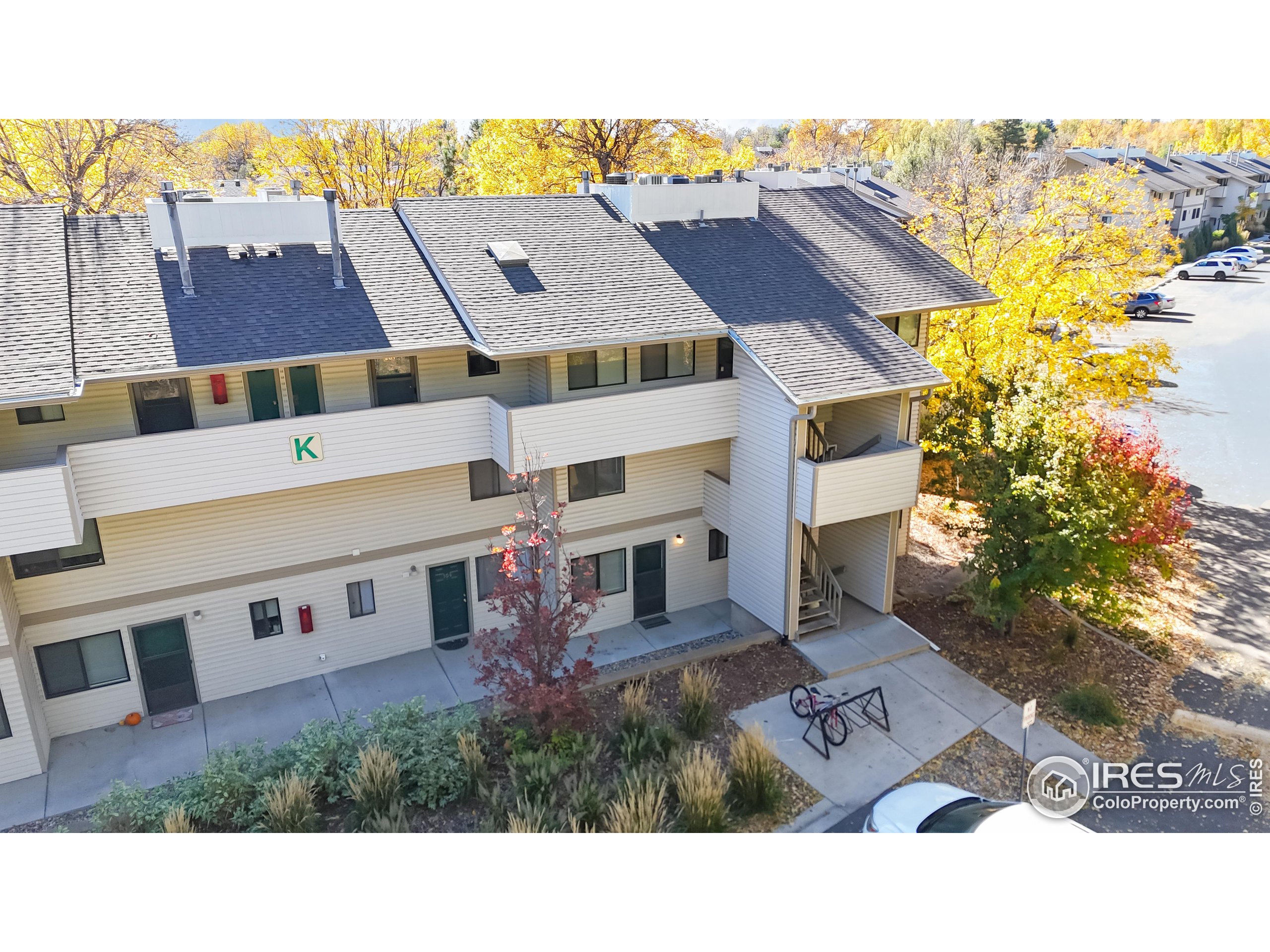 1705 Heatheridge Road, Unit K105 Fort Collins, CO 80526 - Photo 22 of 30 a aerial view of a house with a yard