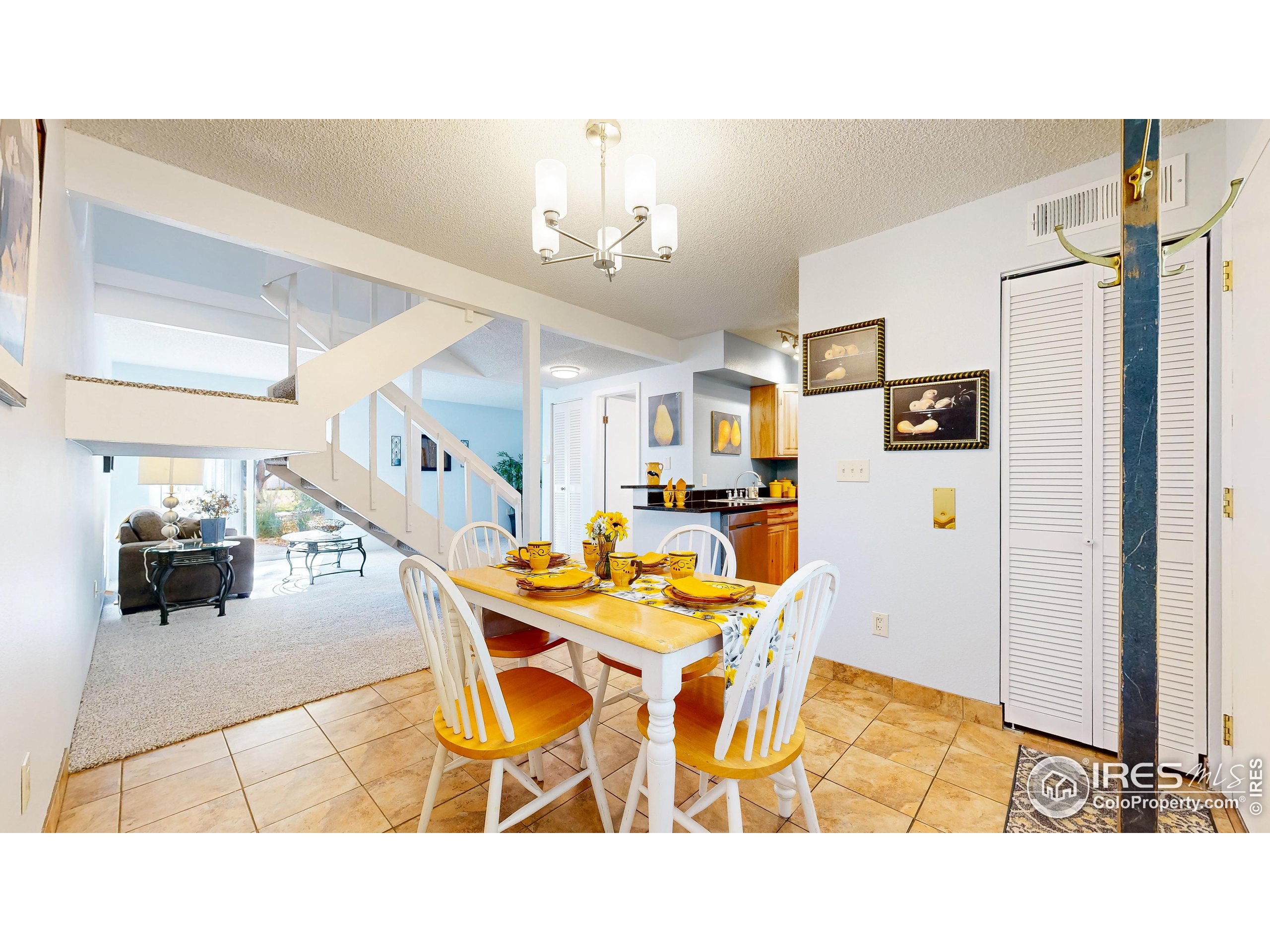 1705 Heatheridge Road, Unit K105 Fort Collins, CO 80526 - Photo 9 of 30 a view of a dining room with furniture