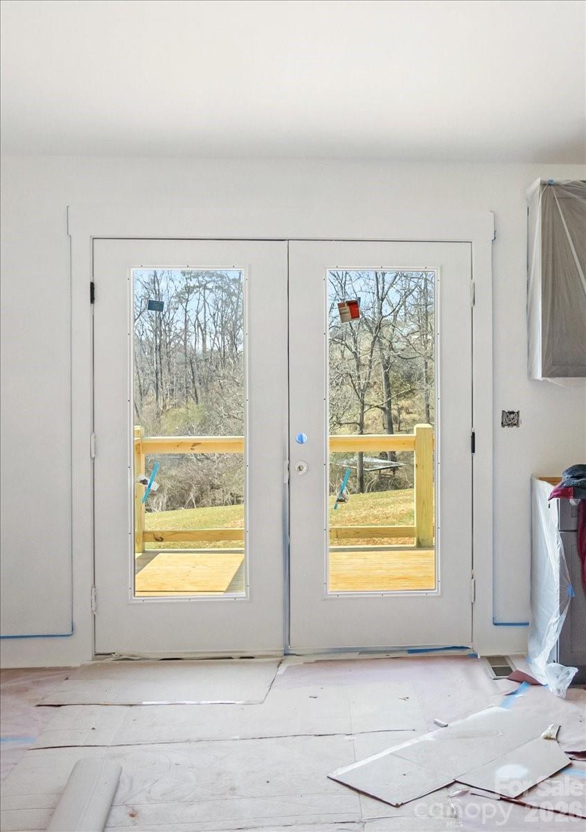 94 Baileys Cove Road, Unit 9 Marshall, NC 28753 - Photo 12 of 30 a view of an empty room and window