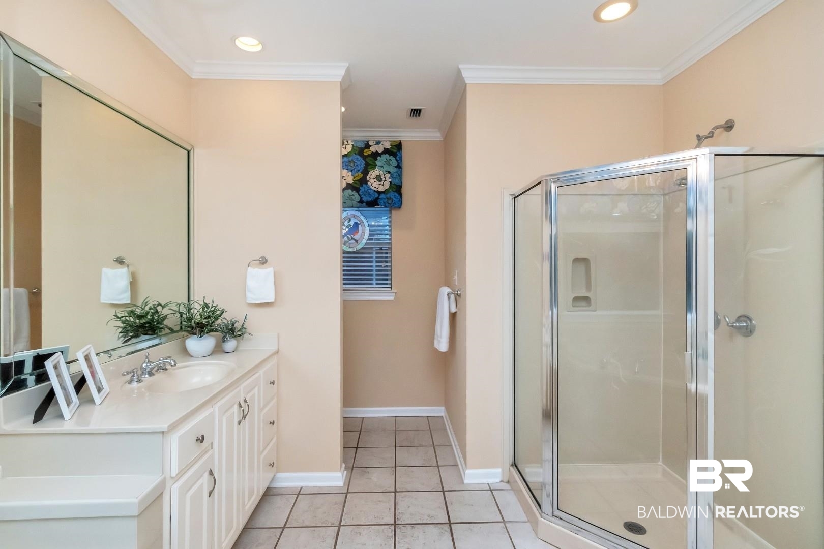 1050 Southern Way Court Mobile, AL 36609 - Photo 15 of 36 Bathroom with a shower with door, crown molding, tile patterned floors, and vanity