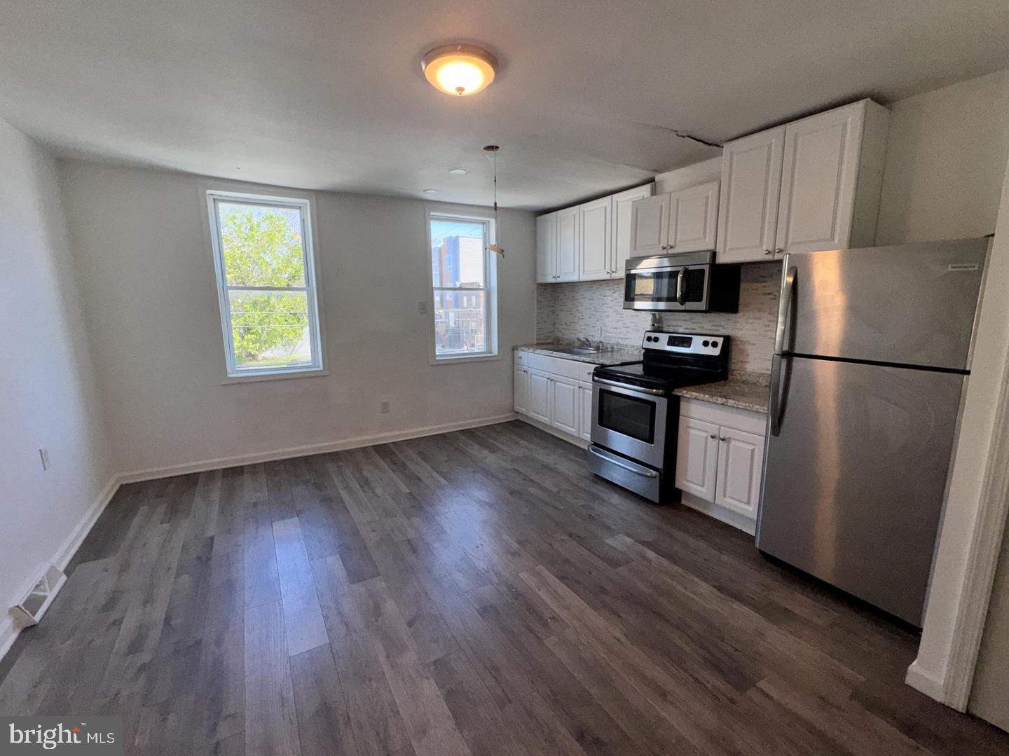2050 Reed Street Philadelphia, PA 19146 - Photo 15 of 23 UNIT 2: KITCHEN / LIVING SPACE