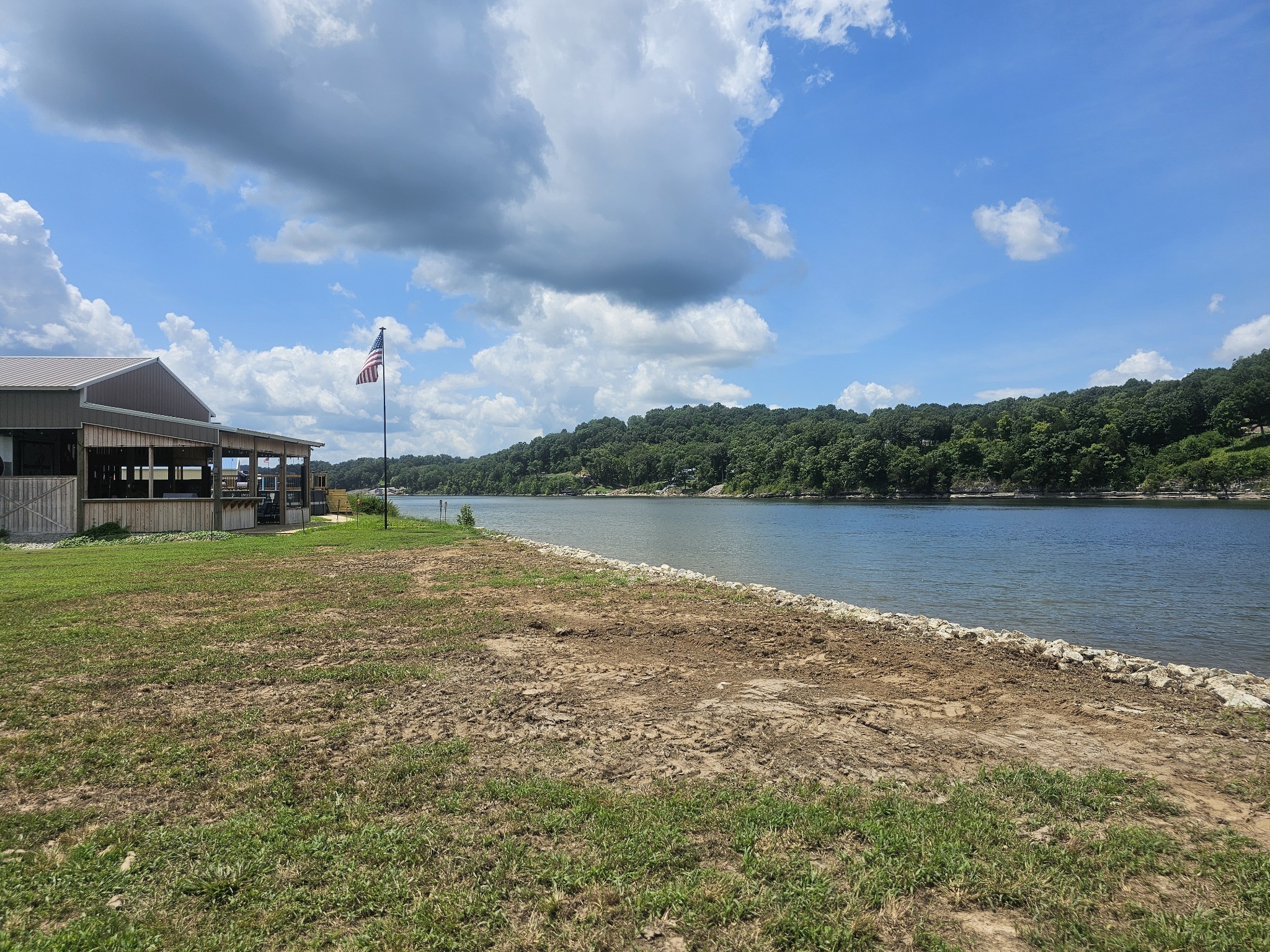 2271 Hardin Bottom River Road Clifton, TN 38425 - Photo 16 of 31 a view of a lake with houses in the back
