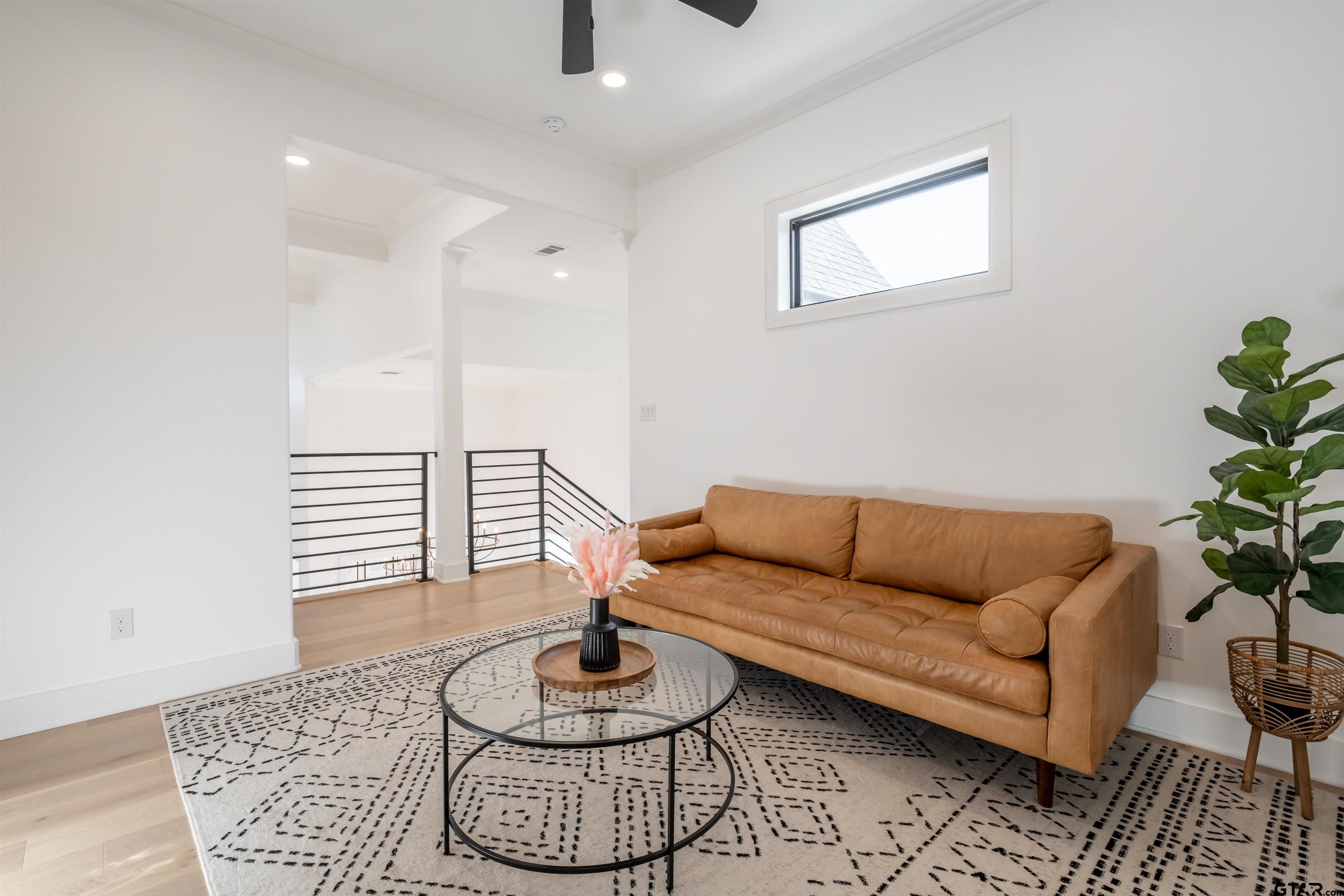 3005 Forest Trail Tyler, TX 75703 - Photo 20 of 32 a living room with furniture and a rug