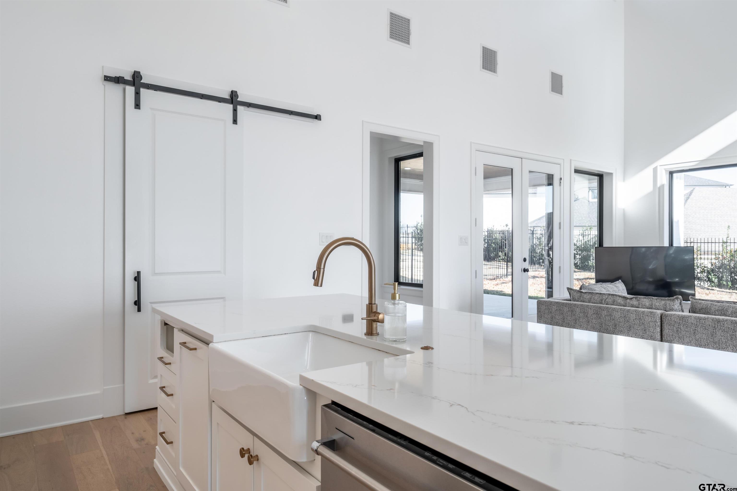 3005 Forest Trail Tyler, TX 75703 - Photo 27 of 32 a kitchen with a sink and appliances