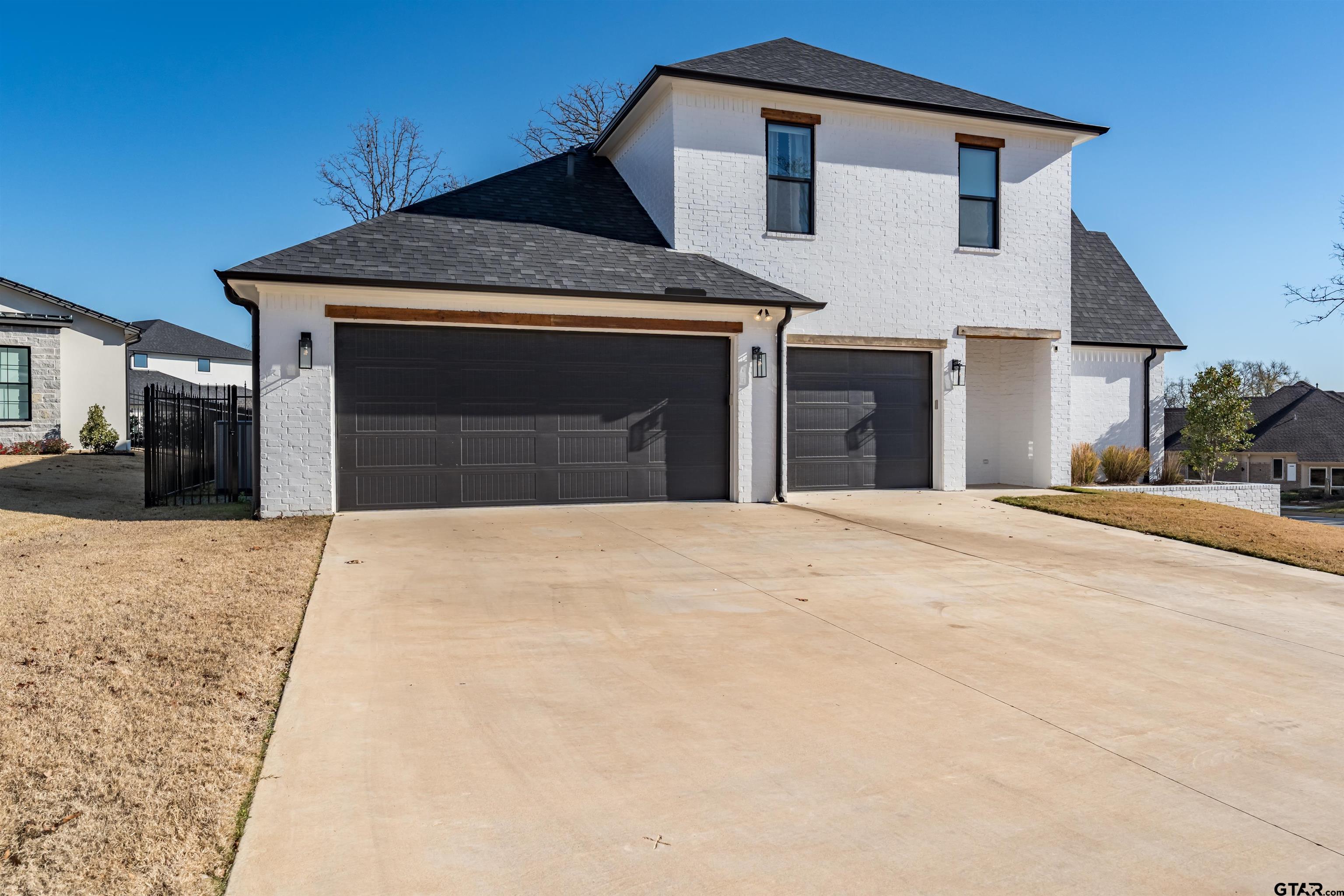 3005 Forest Trail Tyler, TX 75703 - Photo 32 of 32 a front view of a house with a yard