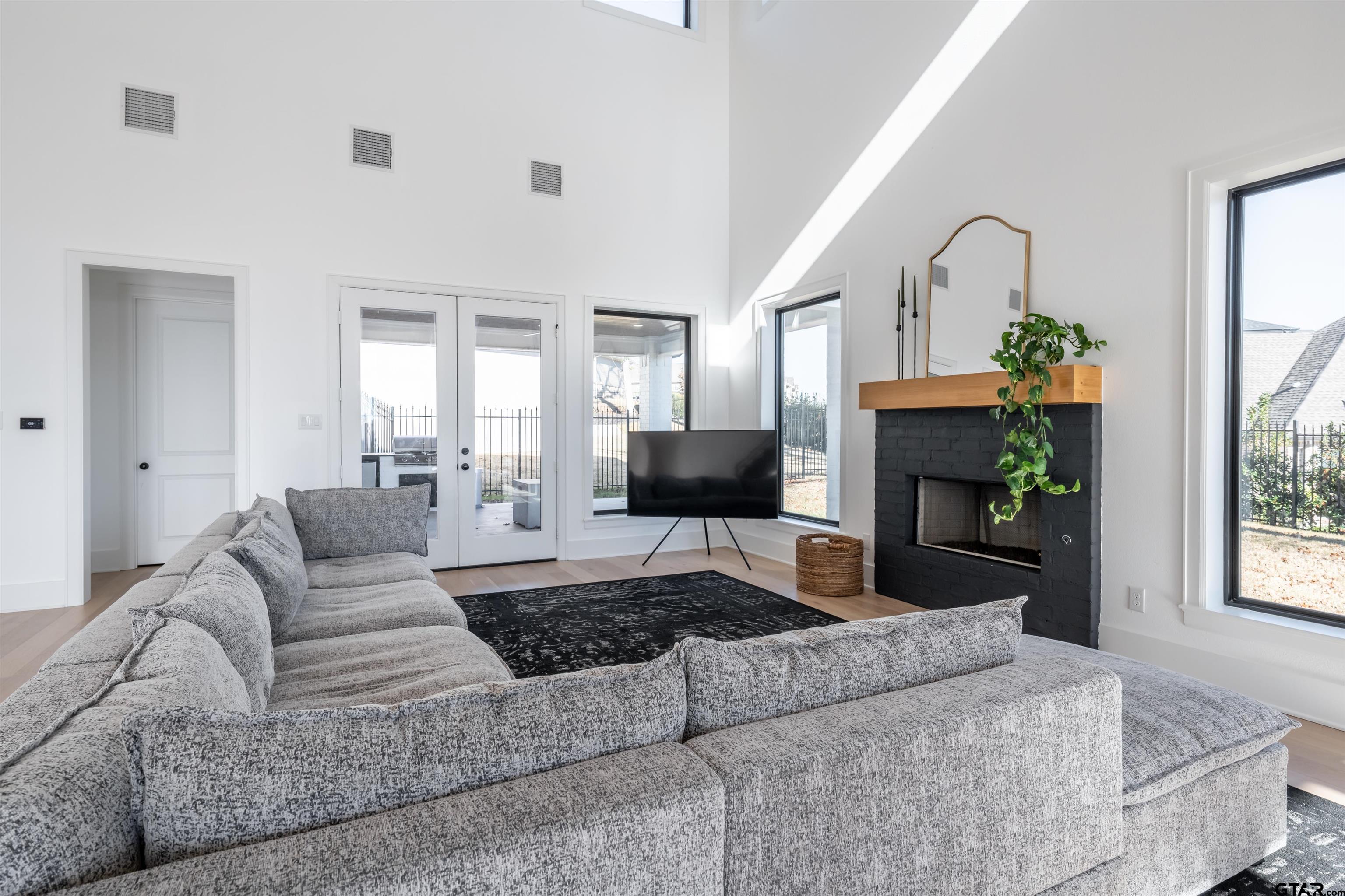 3005 Forest Trail Tyler, TX 75703 - Photo 7 of 32 a living room with furniture fireplace and a window