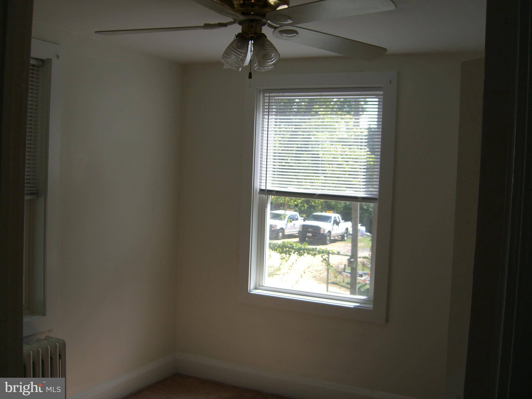 8328 Old Leonardtown Road Hughesville, MD 20637 - Photo 13 of 18 a view of an empty room with a window