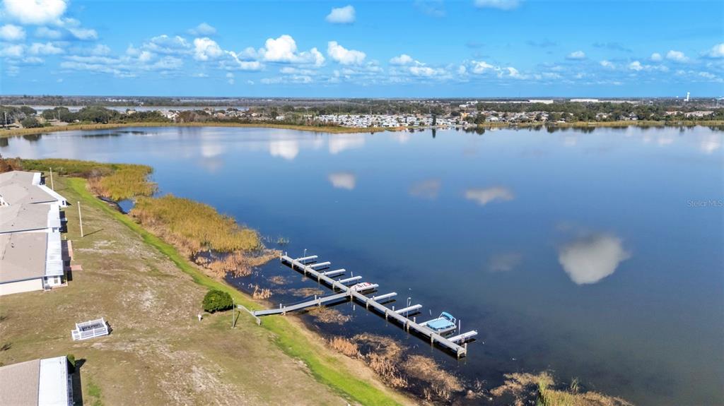 381 Winter Ridge Boulevard Winter Haven, FL 33881 - Photo 16 of 50 an aerial view of a house with a lake view