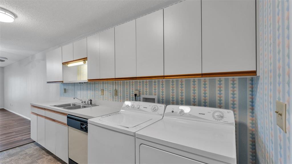 381 Winter Ridge Boulevard Winter Haven, FL 33881 - Photo 22 of 50 a utility room with dryer and washer