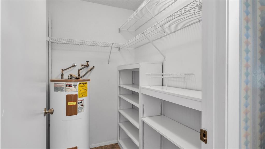 381 Winter Ridge Boulevard Winter Haven, FL 33881 - Photo 24 of 50 a view of a walk in closet