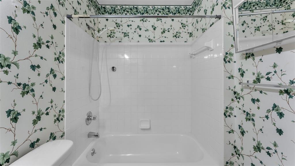 381 Winter Ridge Boulevard Winter Haven, FL 33881 - Photo 29 of 50 a bathroom with a bathtub and shower