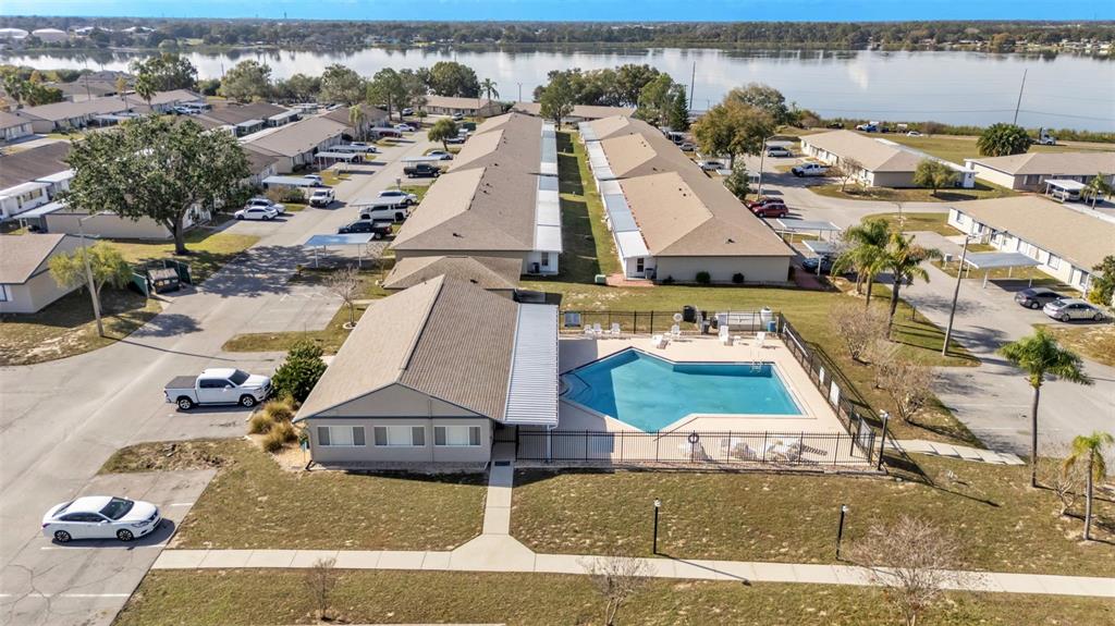 381 Winter Ridge Boulevard Winter Haven, FL 33881 - Photo 31 of 50 an aerial view of a house with a yard