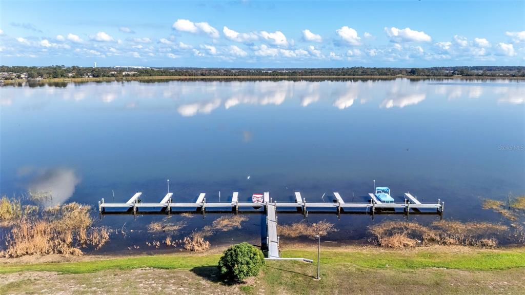381 Winter Ridge Boulevard Winter Haven, FL 33881 - Photo 47 of 50 a view of a lake from a yard