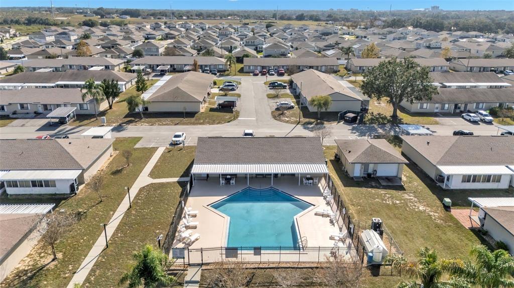 381 Winter Ridge Boulevard Winter Haven, FL 33881 - Photo 49 of 50 an aerial view of a house with a garden
