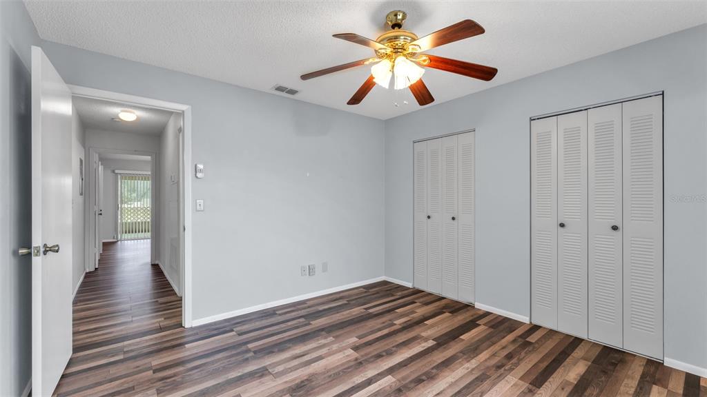 381 Winter Ridge Boulevard Winter Haven, FL 33881 - Photo 5 of 50 a view of a livingroom with wooden floor