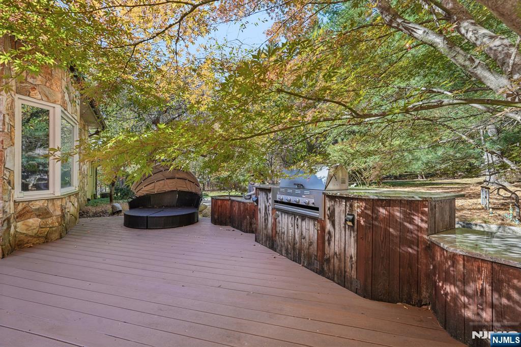 59 Old Stone Church Road Upper Saddle River, NJ 07458 - Photo 19 of 24 a view of a balcony with furniture