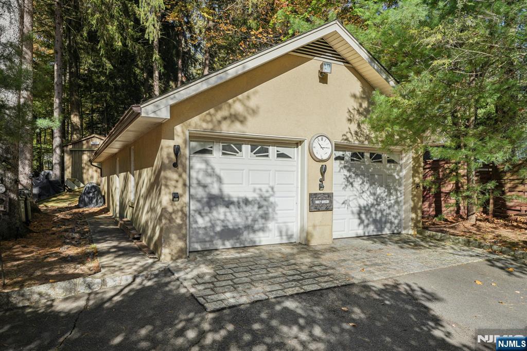 59 Old Stone Church Road Upper Saddle River, NJ 07458 - Photo 21 of 24 a view of a house with a yard