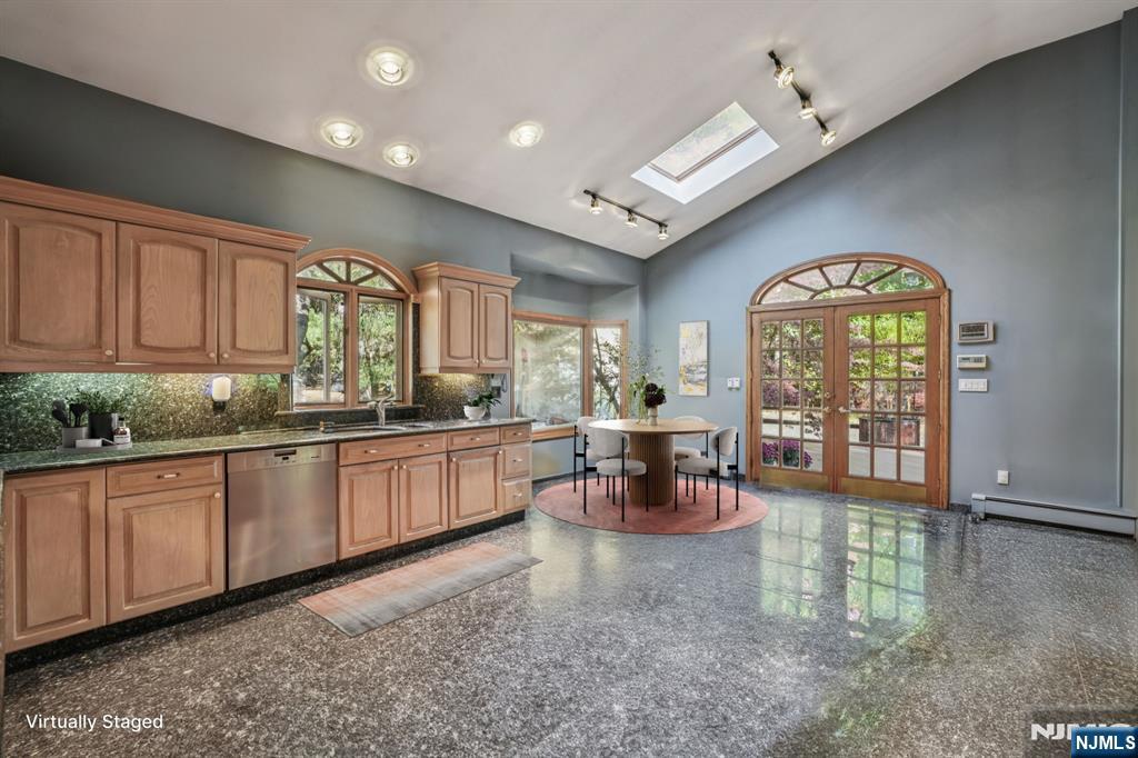 59 Old Stone Church Road Upper Saddle River, NJ 07458 - Photo 4 of 24 a large living room with a large window