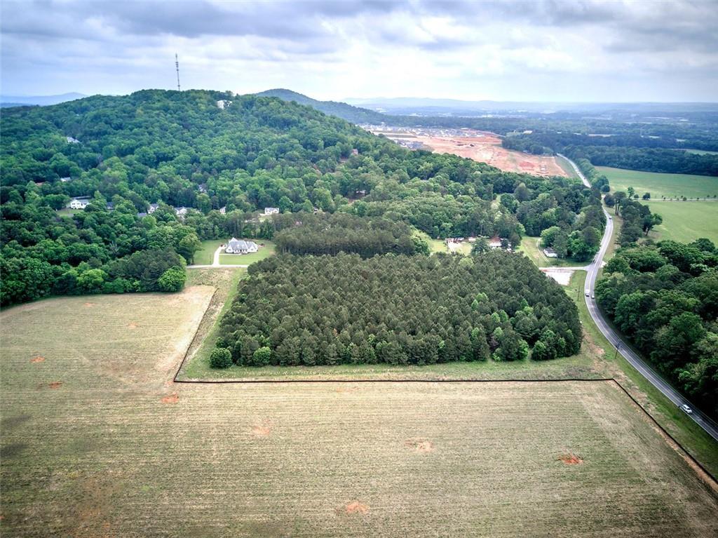 720 Euharlee Road Southwest Cartersville, GA 30120 - Photo 6 of 13 a view of a yard with an trees