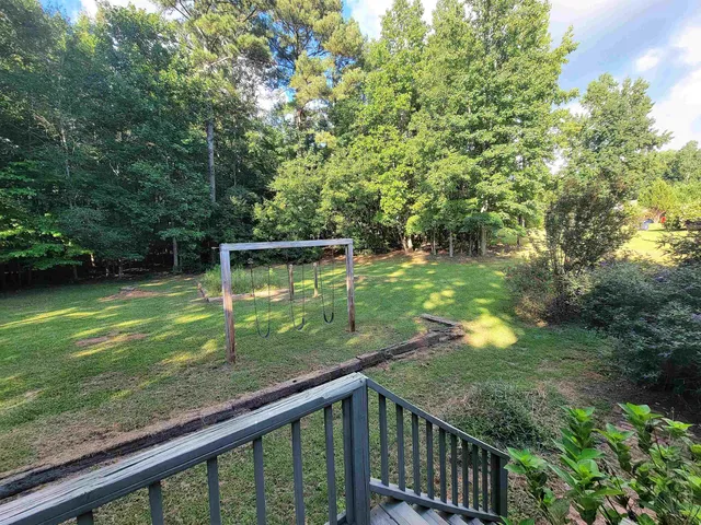 a view of a backyard with a garden