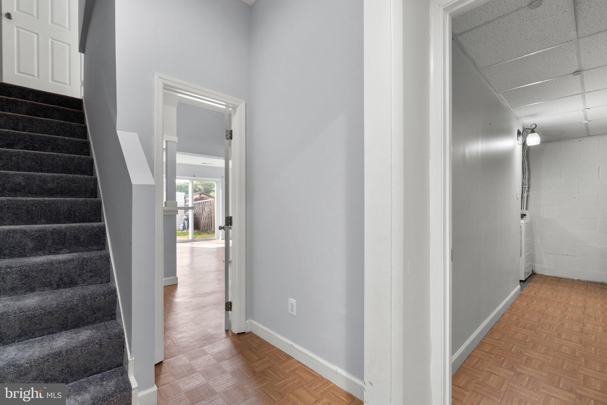 9130 Bobwhite Circle Gaithersburg, MD 20879 - Photo 24 of 36 a view of a hallway with wooden floor and entryway
