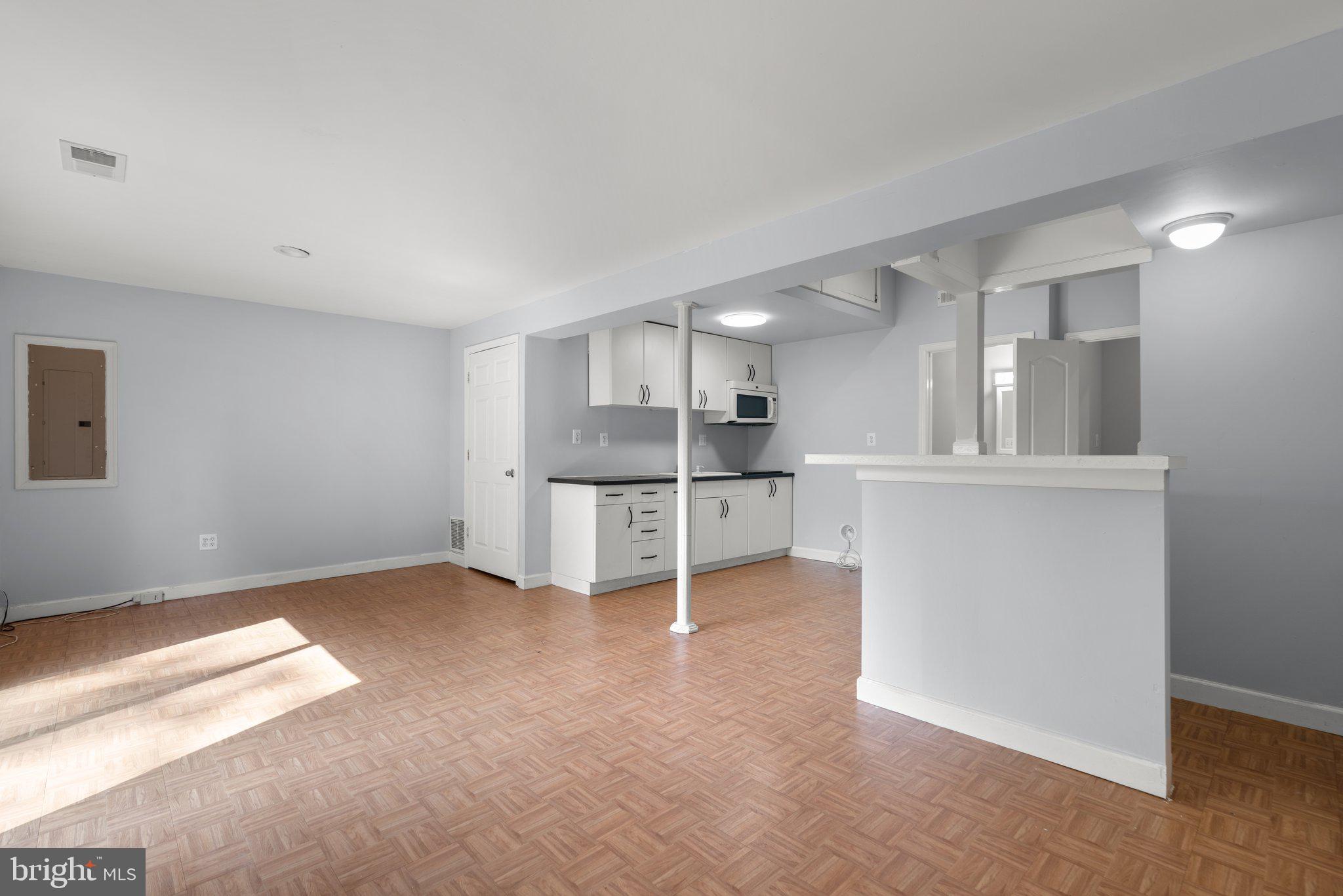 9130 Bobwhite Circle Gaithersburg, MD 20879 - Photo 30 of 36 a view of a kitchen with large windows