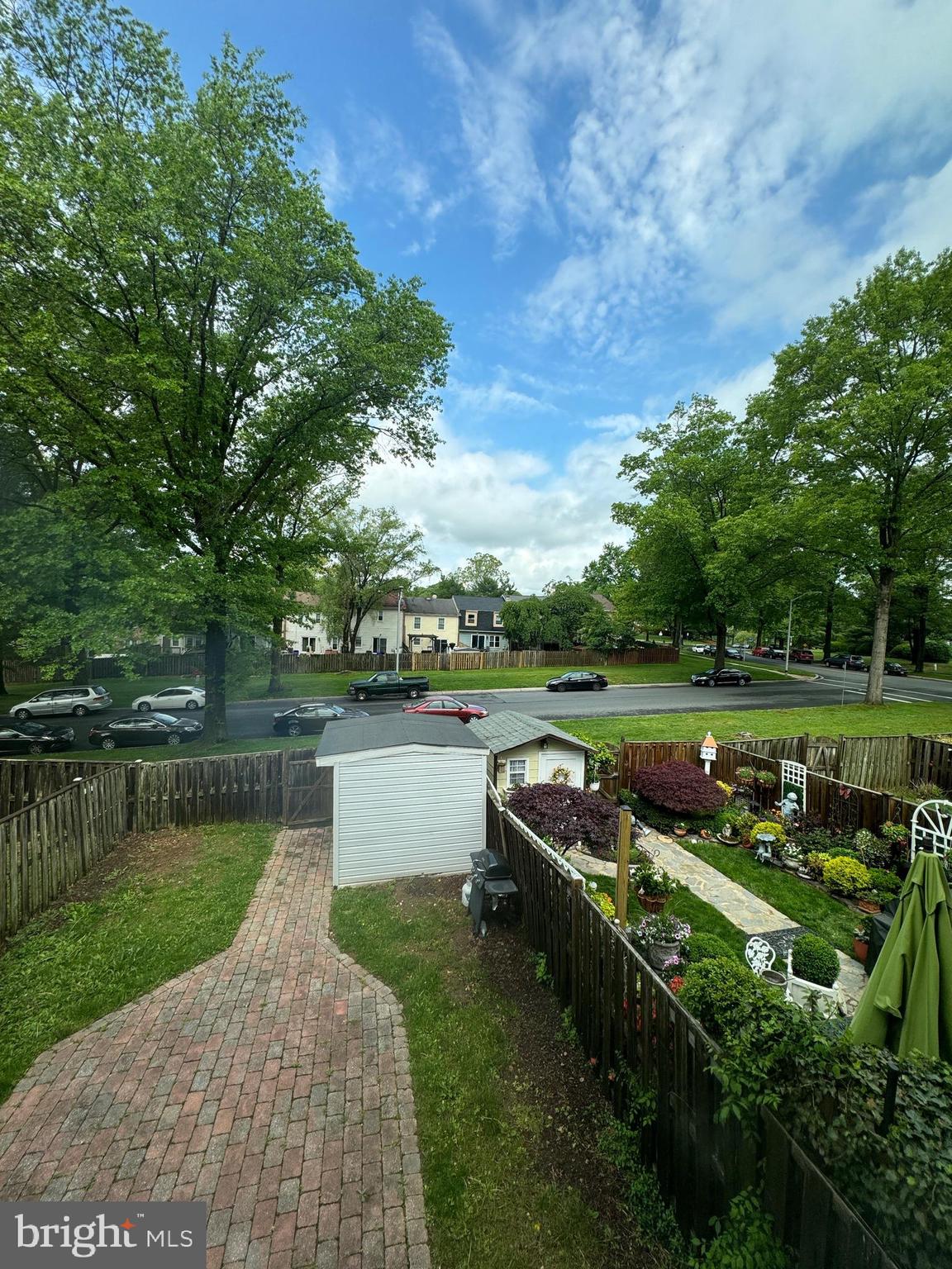9130 Bobwhite Circle Gaithersburg, MD 20879 - Photo 7 of 36 a view of a lake with a yard and green space