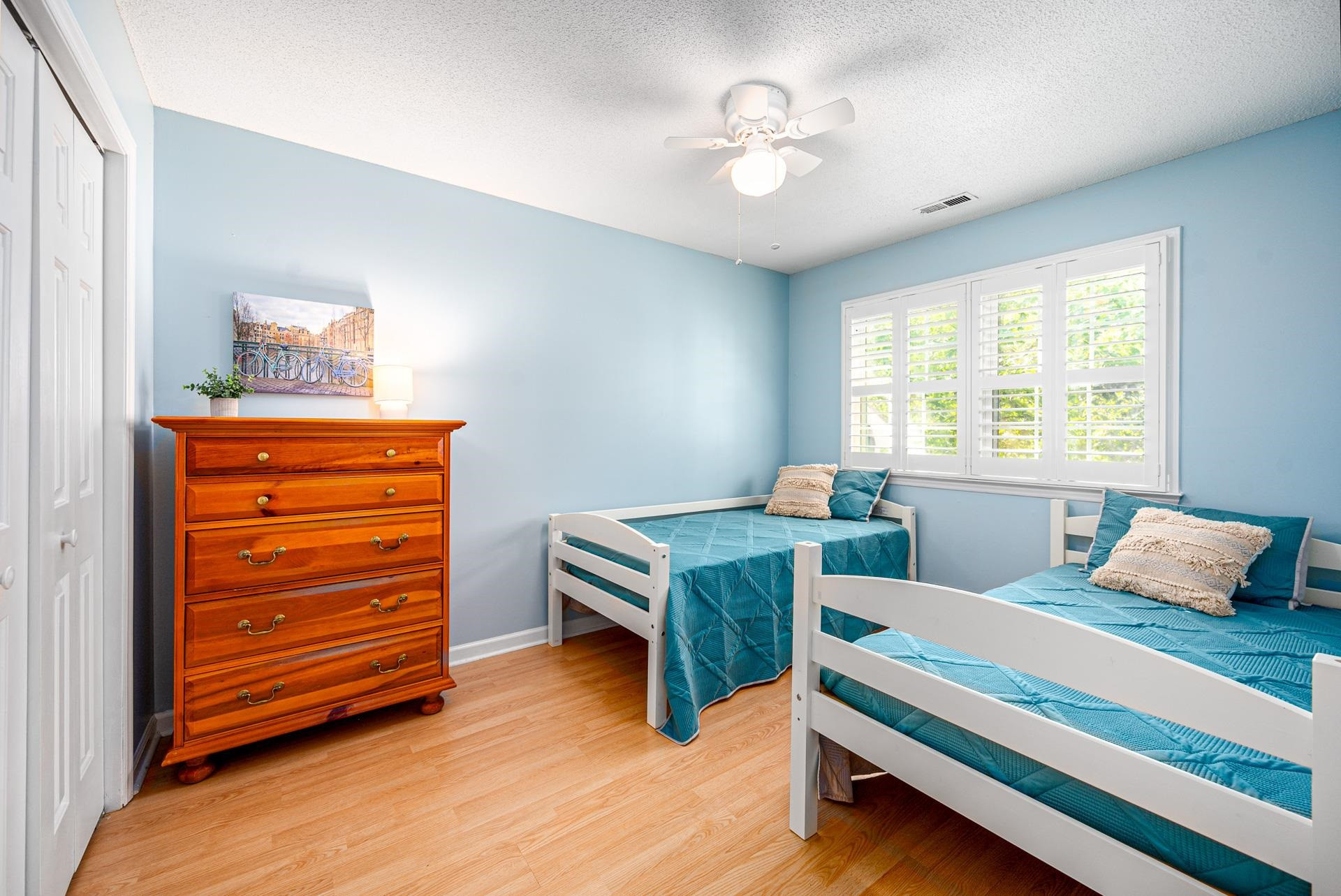 118 Long Shadow Place Durham, NC 27713 - Photo 15 of 24 a bedroom with a bed and a dresser
