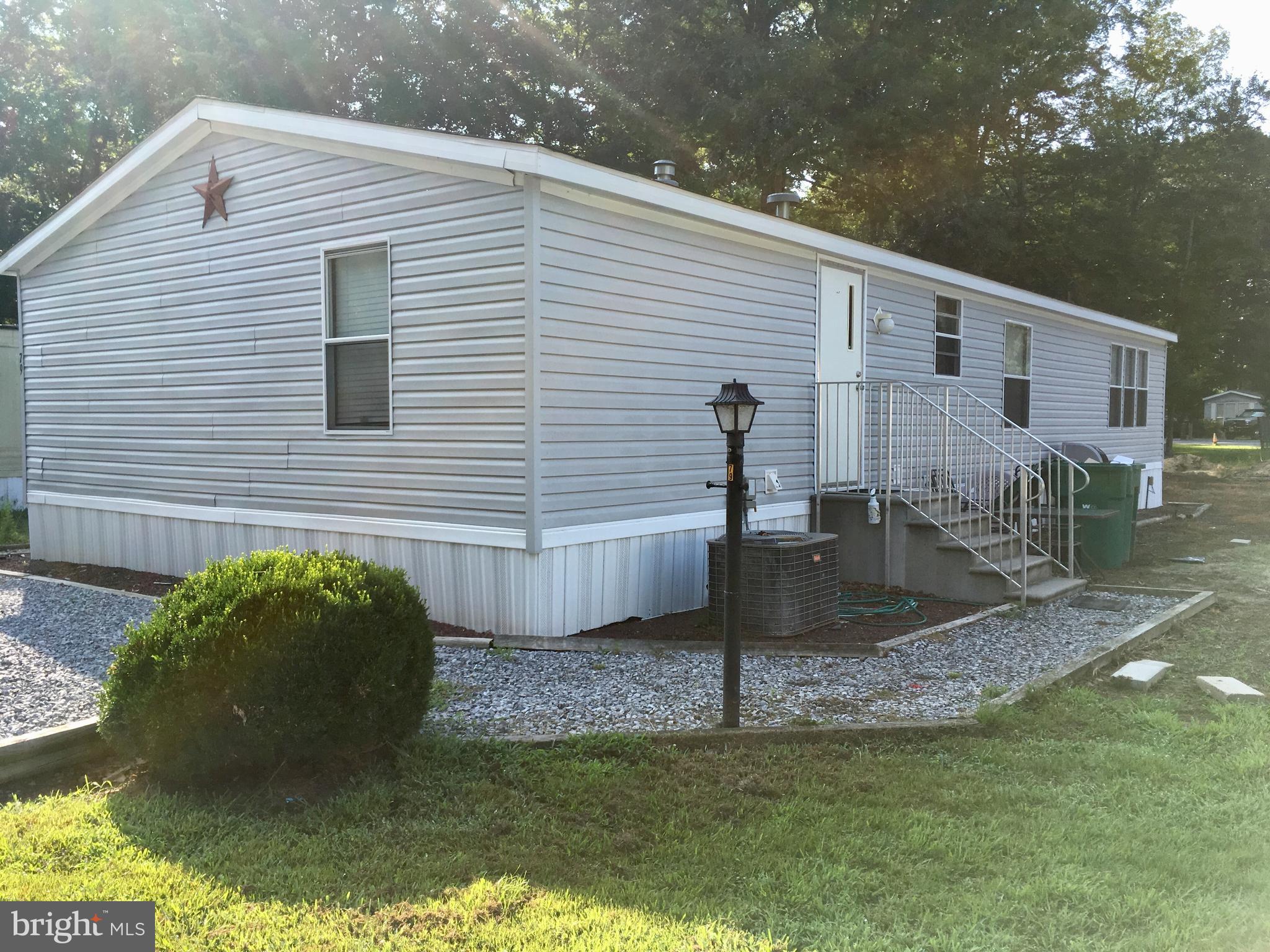 12623 Shell Mill Road, Unit 79 Bishopville, MD 21813 - Photo 17 of 19 Right side of home