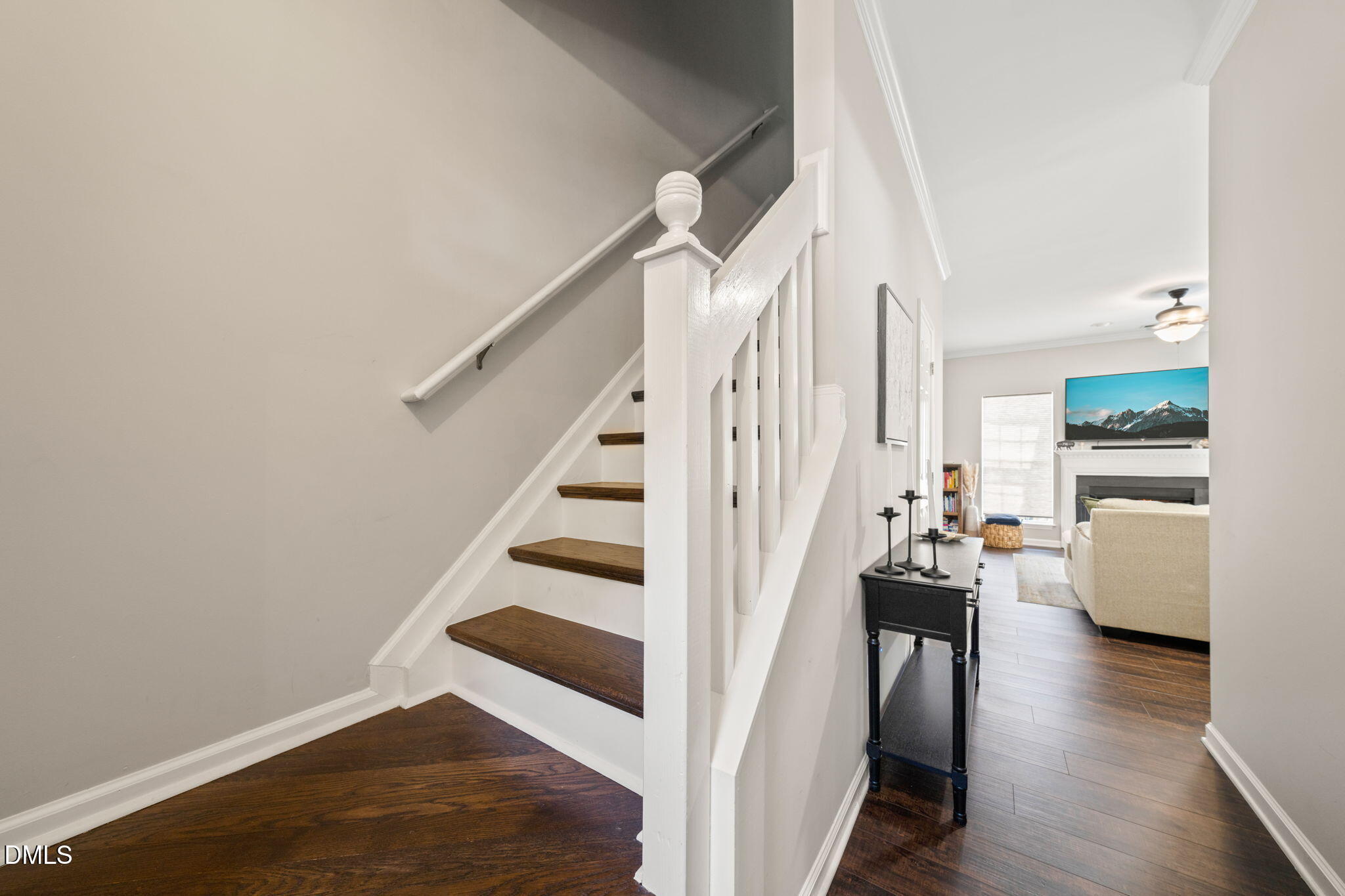 4323 Pine Springs Court Raleigh, NC 27613 - Photo 16 of 38 a view of entryway and hall with wooden floor