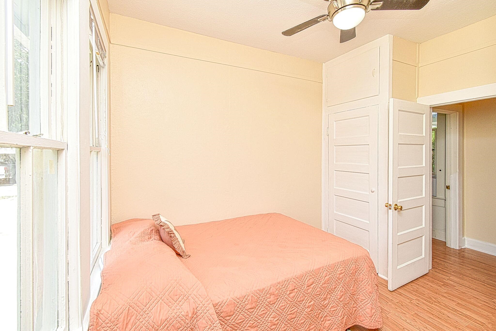 7 Dupont Lane St. Augustine, FL 32084 - Photo 5 of 39 a bedroom with a bed and wooden floor