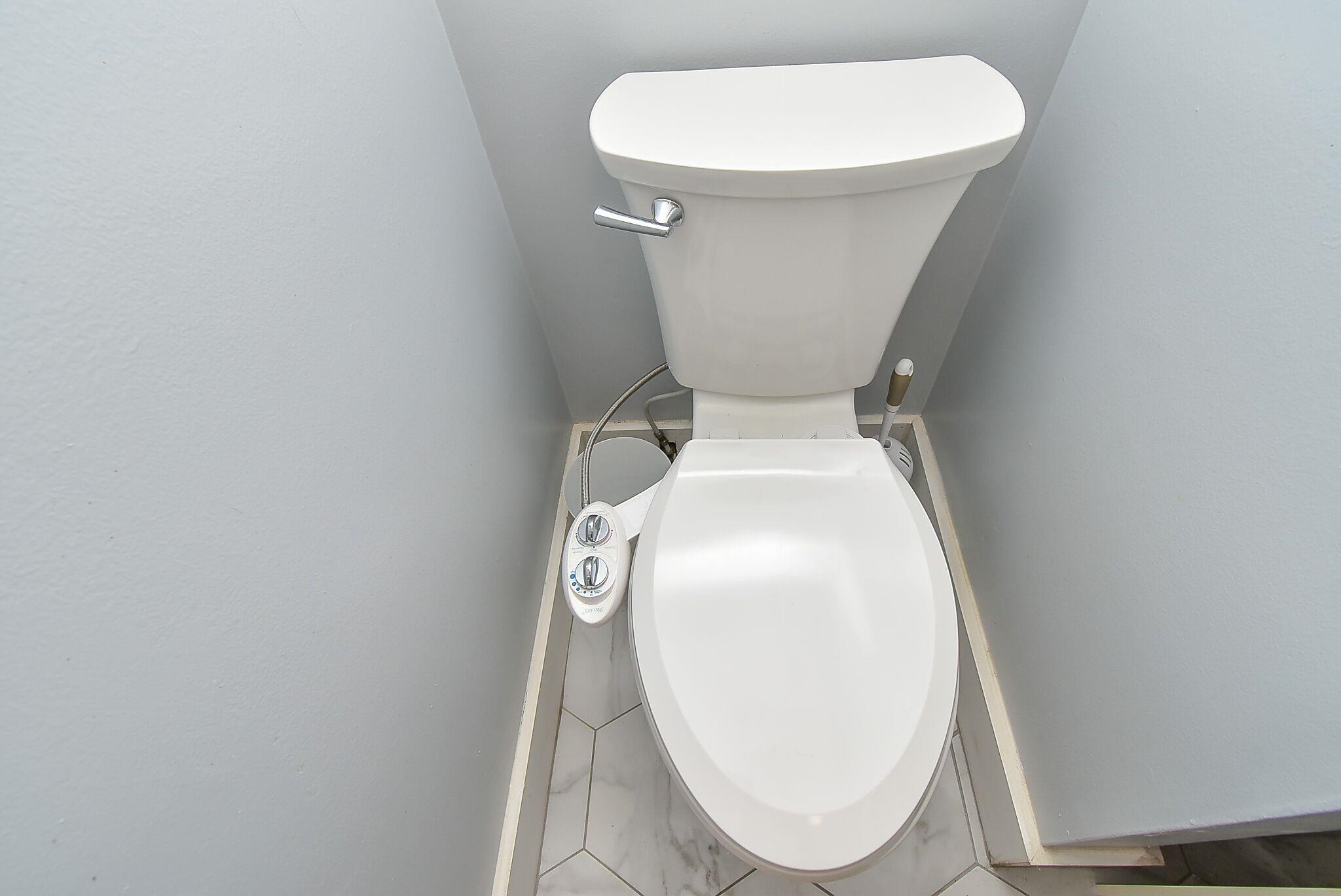 7 Dupont Lane St. Augustine, FL 32084 - Photo 8 of 39 a white toilet sitting next to a white sink