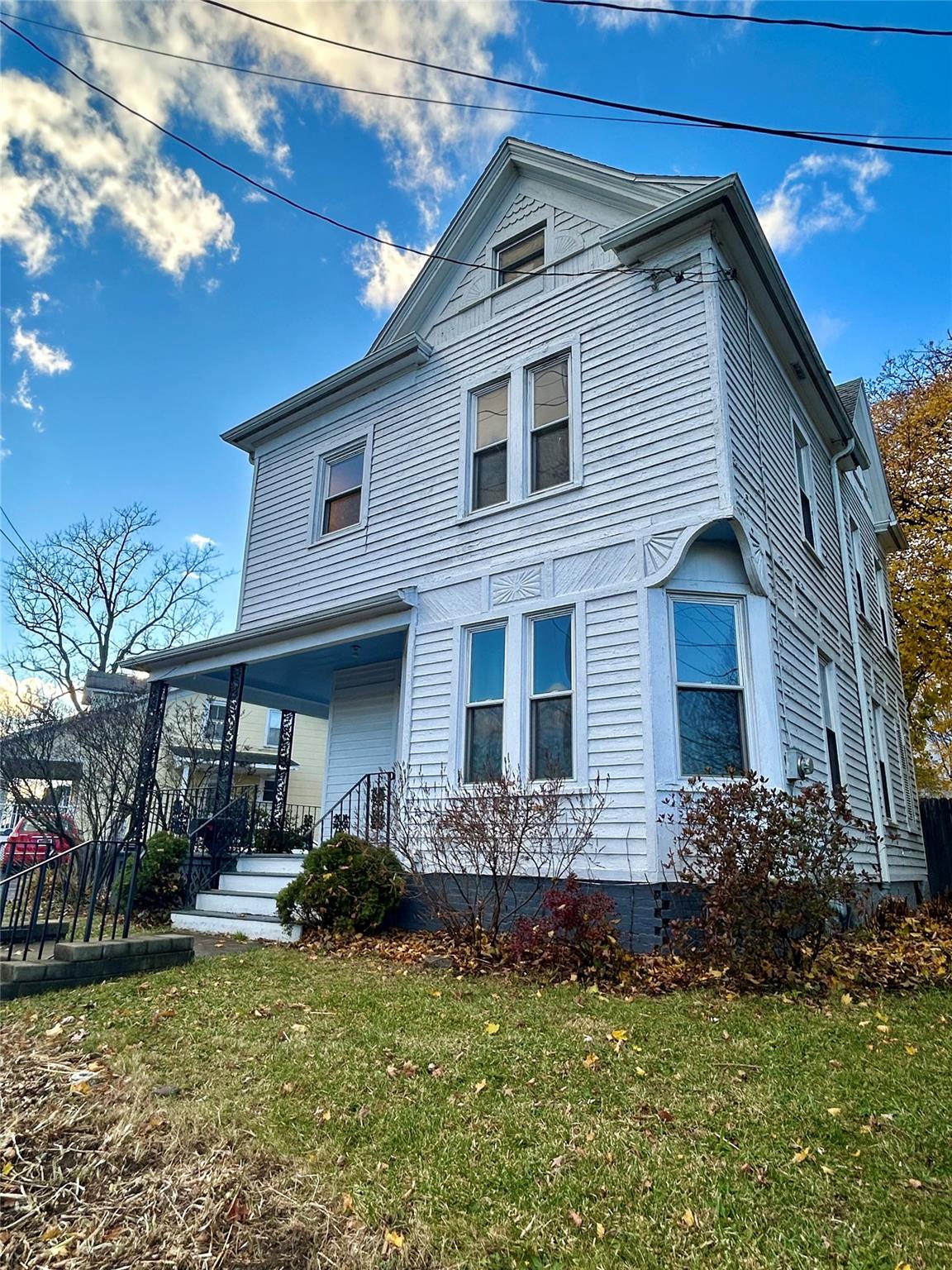 95 Maple Avenue Catskill, NY 12414 - Photo 1 of 1 View of front of property featuring covered porch and a front yard