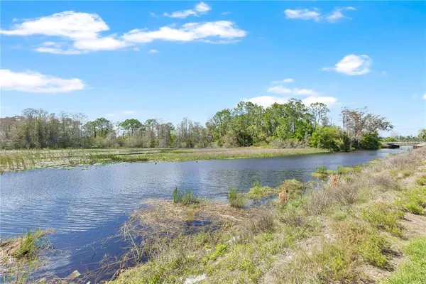 a view of a lake from a yard