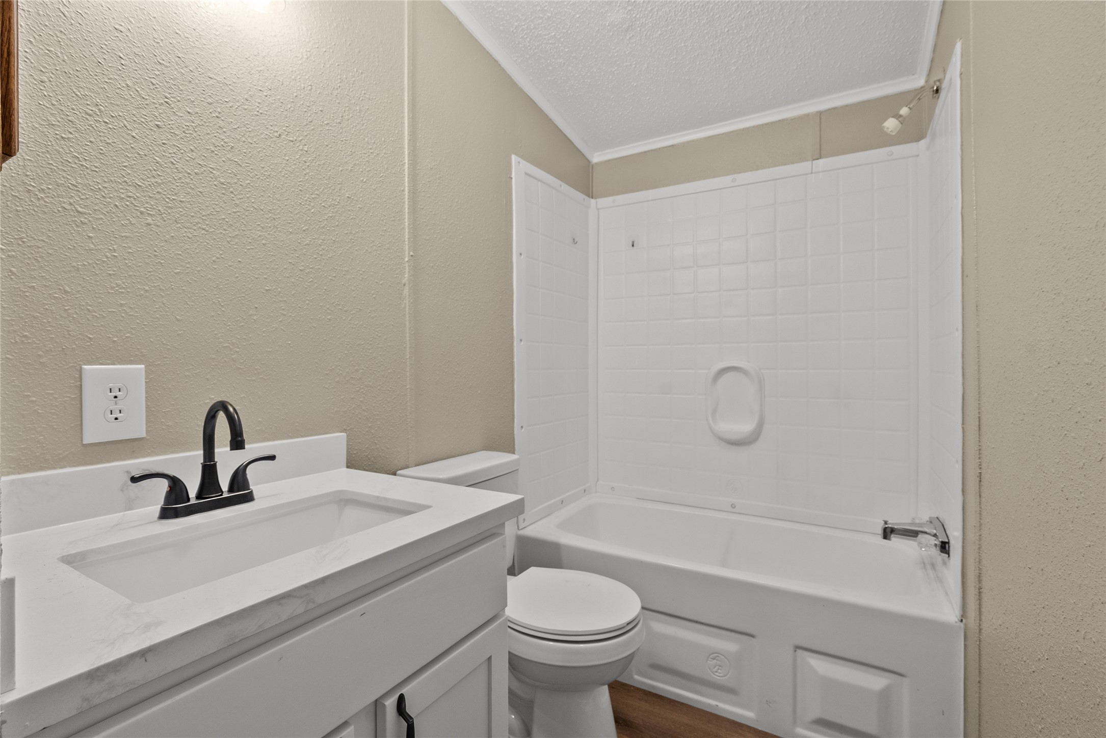 12902 Indian Ridge Drive Dayton, TX 77535 - Photo 25 of 31 a bathroom with a sink a toilet and shower