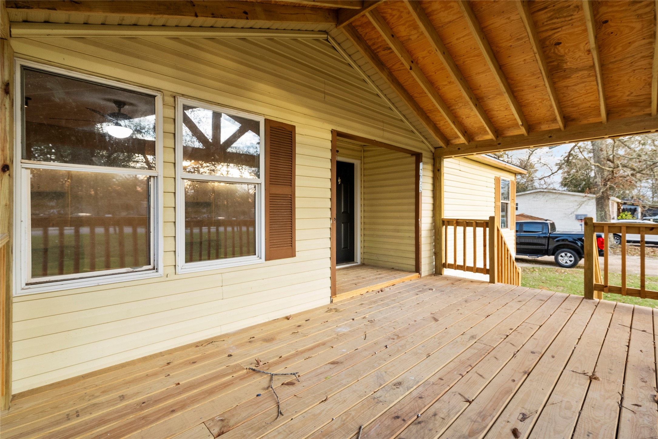 12902 Indian Ridge Drive Dayton, TX 77535 - Photo 5 of 31 a view of a house with a porch