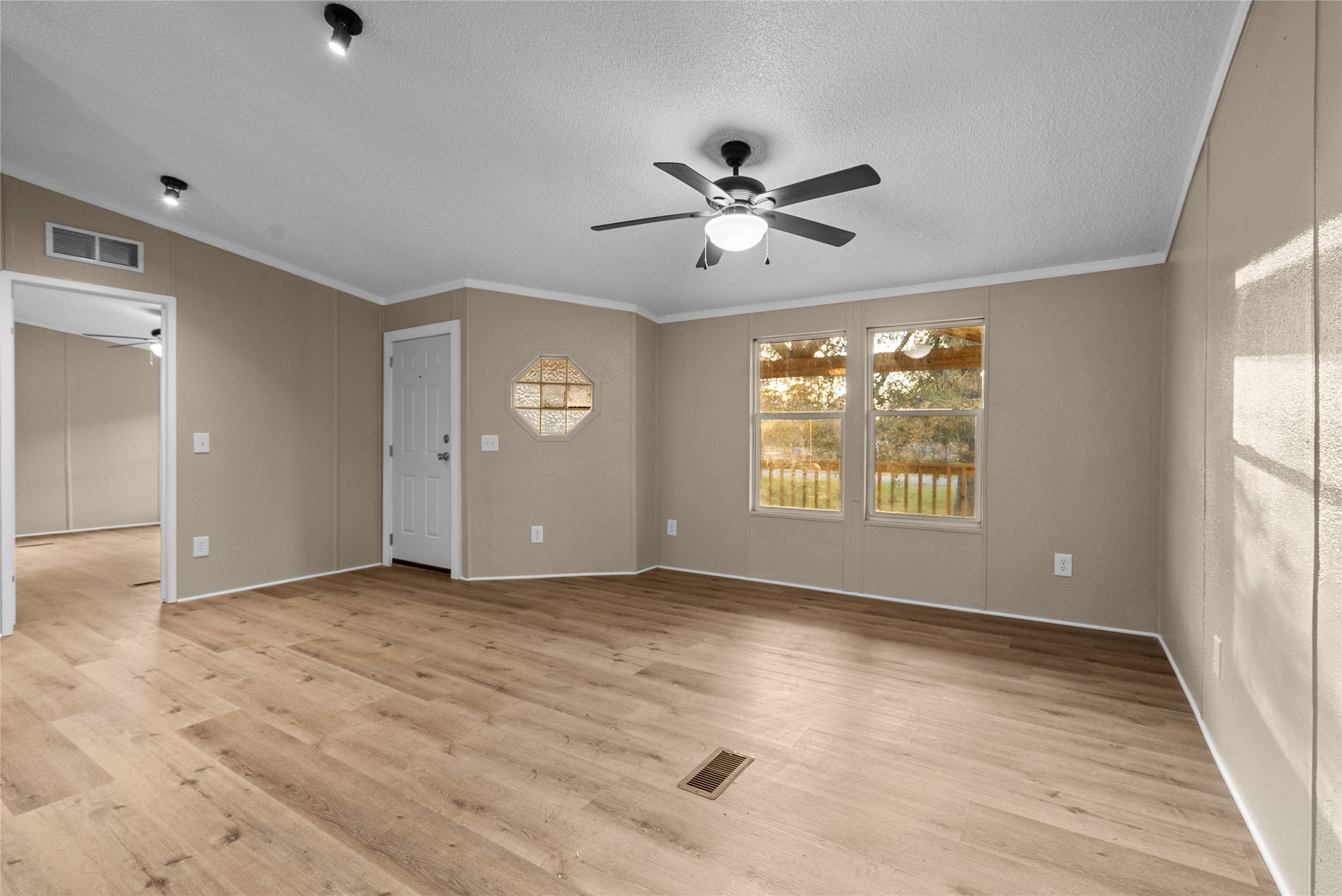 12902 Indian Ridge Drive Dayton, TX 77535 - Photo 10 of 31 a view of an empty room with a window