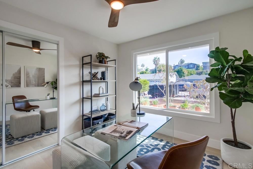 14224 Recuerdo Drive Del Mar, CA 92014 - Photo 18 of 21 a living room with furniture and a potted plant