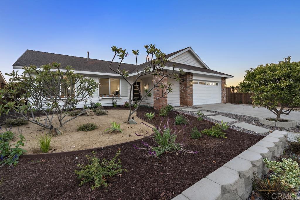 14224 Recuerdo Drive Del Mar, CA 92014 - Photo 21 of 21 a front view of a house with garden