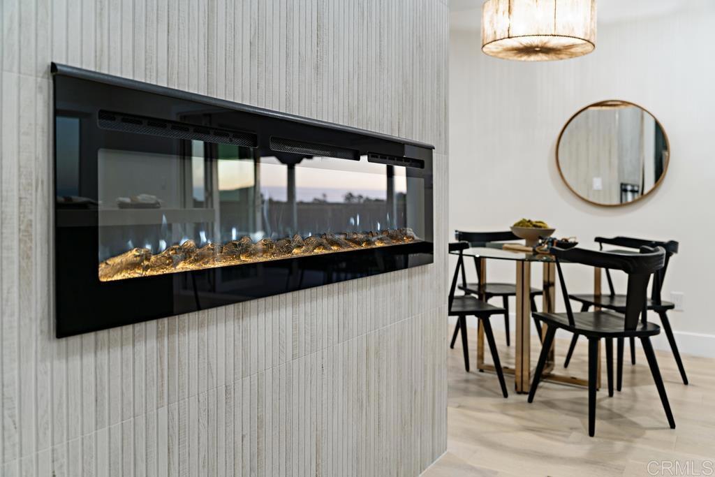 14224 Recuerdo Drive Del Mar, CA 92014 - Photo 5 of 21 a view of a dining room with furniture and chandelier