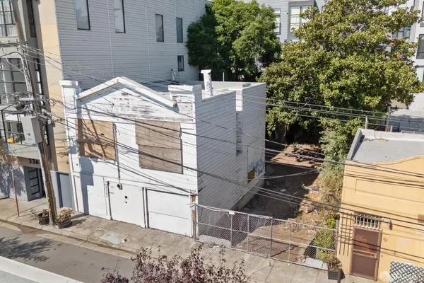 a view of a house with a street