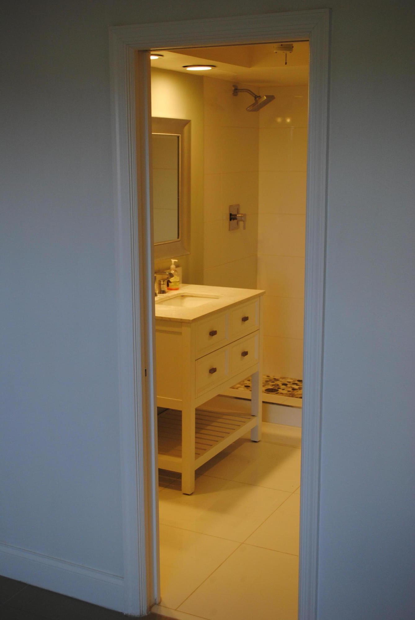 750 Northeast Spanish River Boulevard, Unit 503 Boca Raton, FL 33431 - Photo 13 of 32 a bathroom with a sink and a mirror
