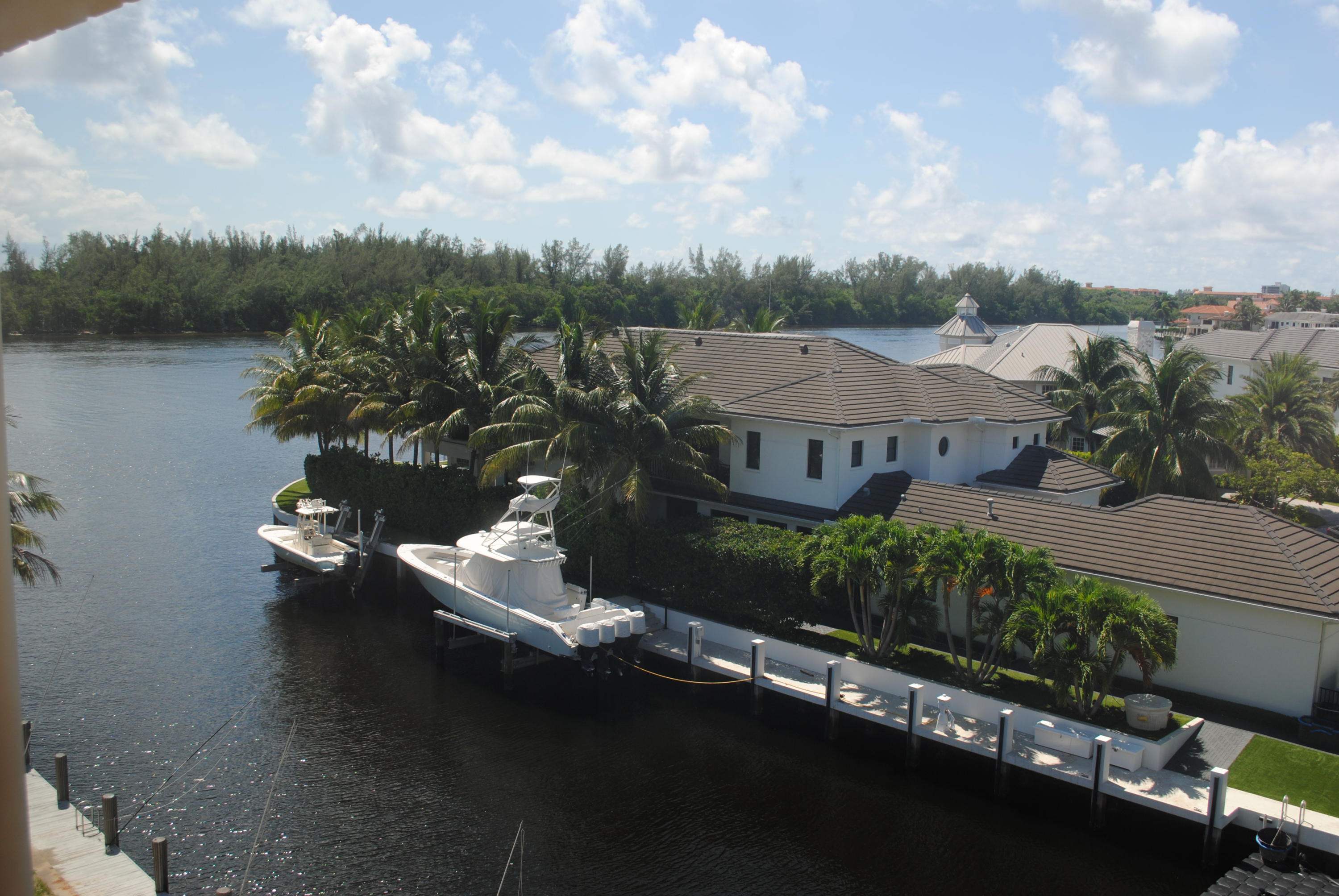 750 Northeast Spanish River Boulevard, Unit 503 Boca Raton, FL 33431 - Photo 16 of 32 an aerial view of a house with a garden