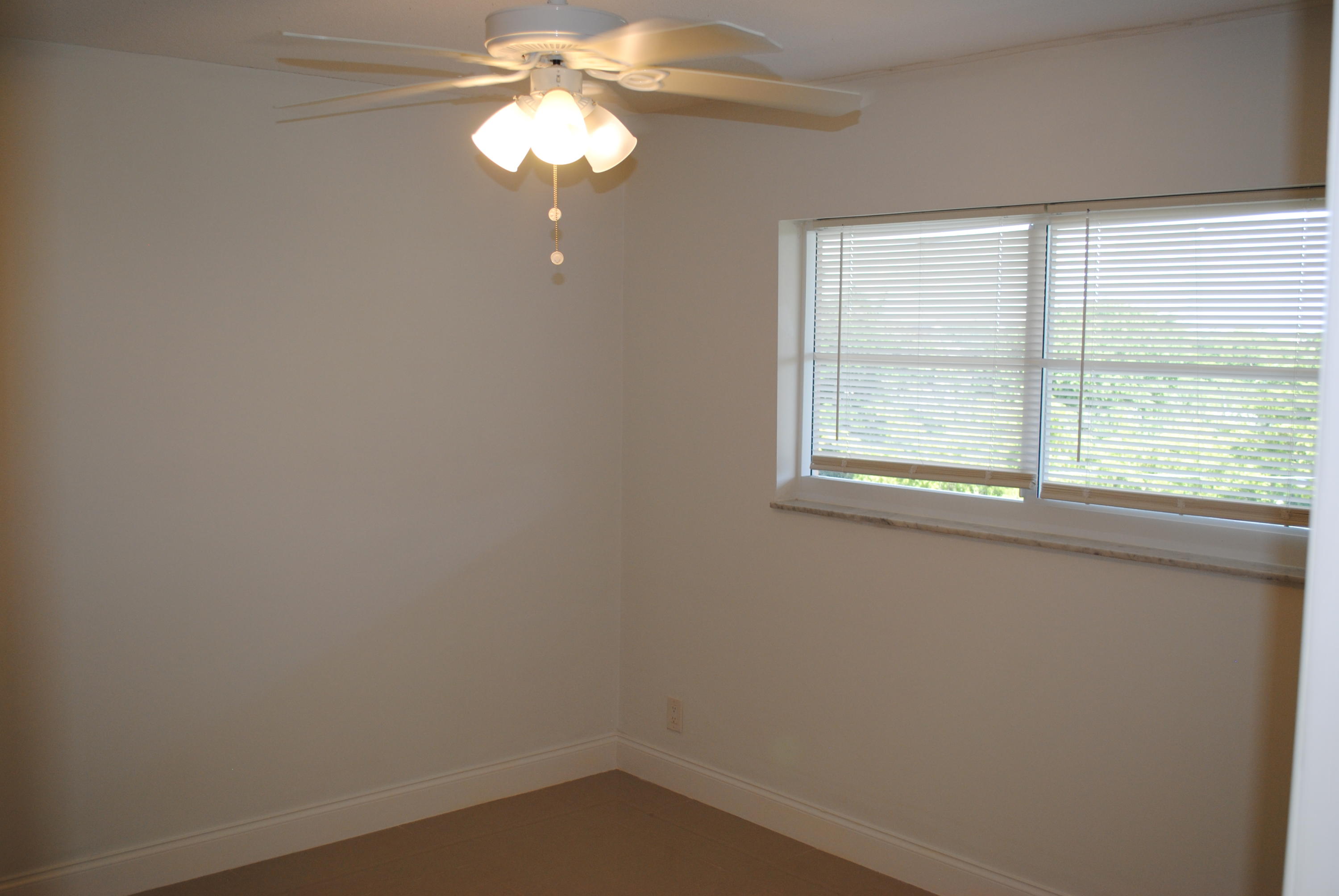 750 Northeast Spanish River Boulevard, Unit 503 Boca Raton, FL 33431 - Photo 23 of 32 an empty room with a window